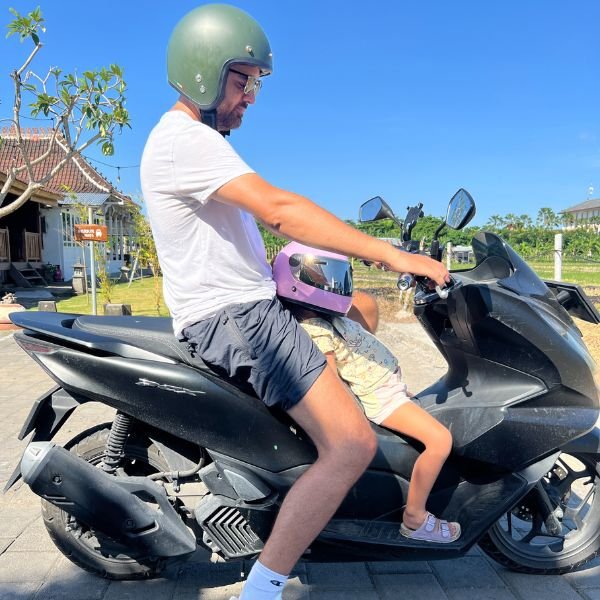 riding scooter in bali with kids